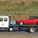 Tow truck company offering vehicle transport to car shows and car auctions.